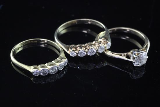 Three diamond set rings.